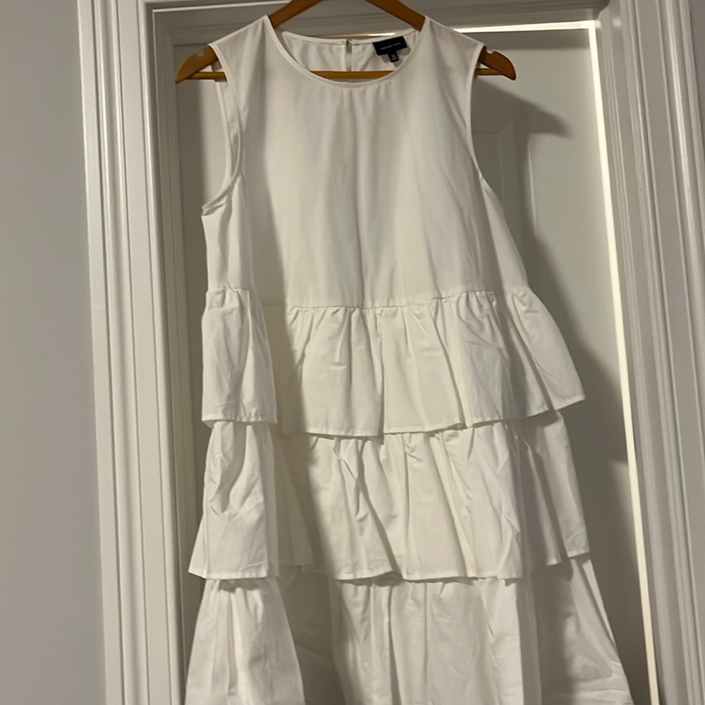 Brand new white ruffle dress.